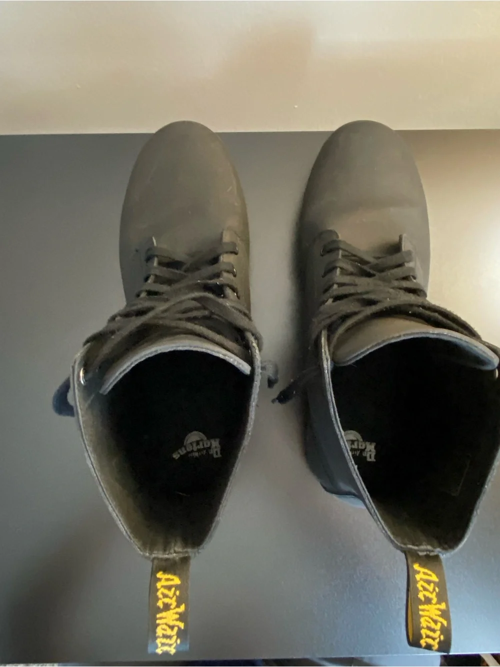 Dr. Martens Black Leather High-Top Lace-Up Boots with Yellow Stitching